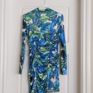 Ruched floral mini dress. Fashionova